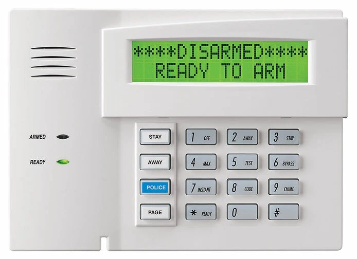 Old alarm keypad — before AlarmEvolved